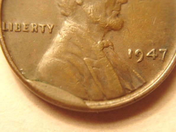 1947-P--Wheatback--Obverse-Cud